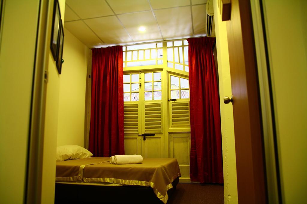 28 Bahari Hotel Джордж Таун Стая снимка